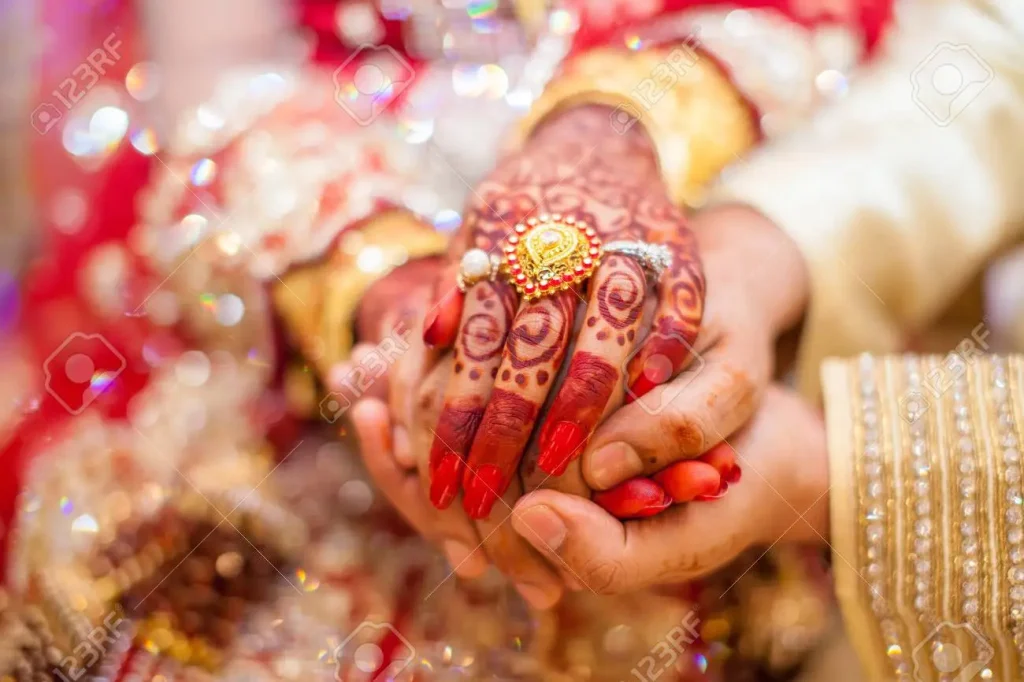 Bride's hand colored with henna during court marriage in pakistan